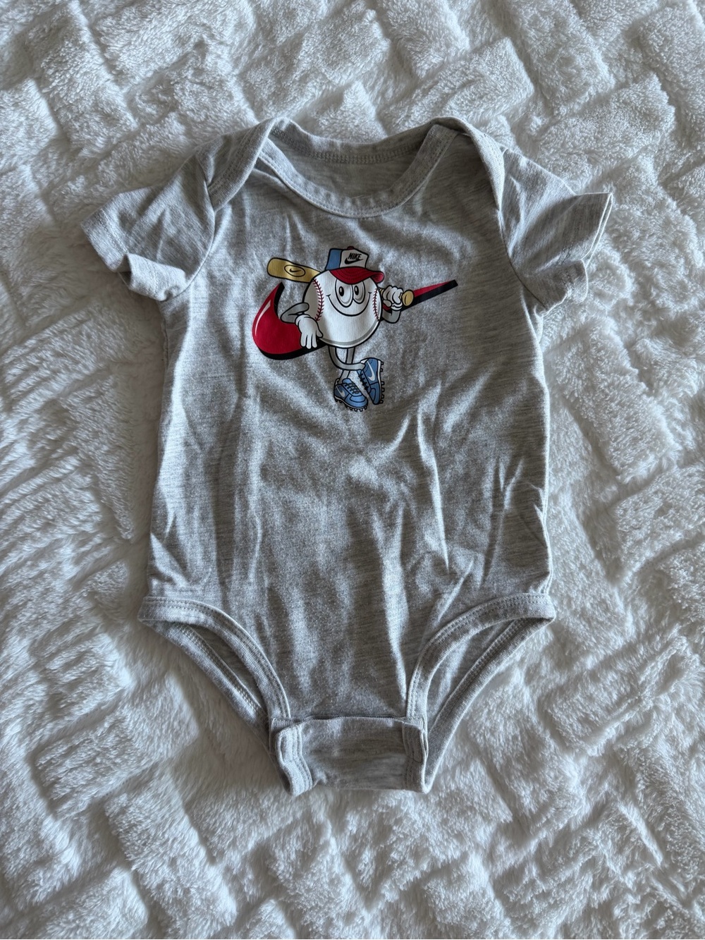 Nike Gray Baby Baseball Graphic One-Piece Bodysuit with Red and Blue Accents